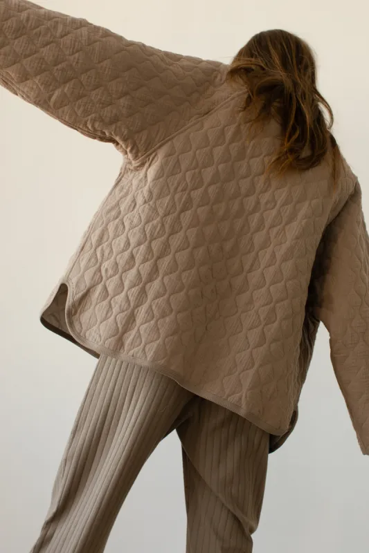 The Quilted Jacket sold by DONNI.