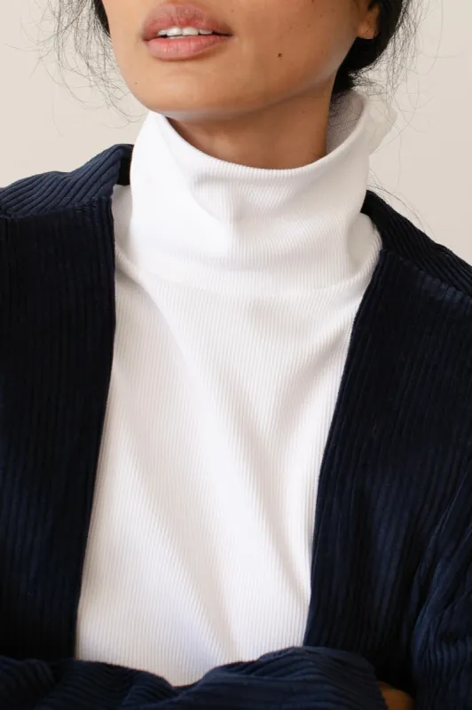 The Rib Turtleneck sold by DONNI.