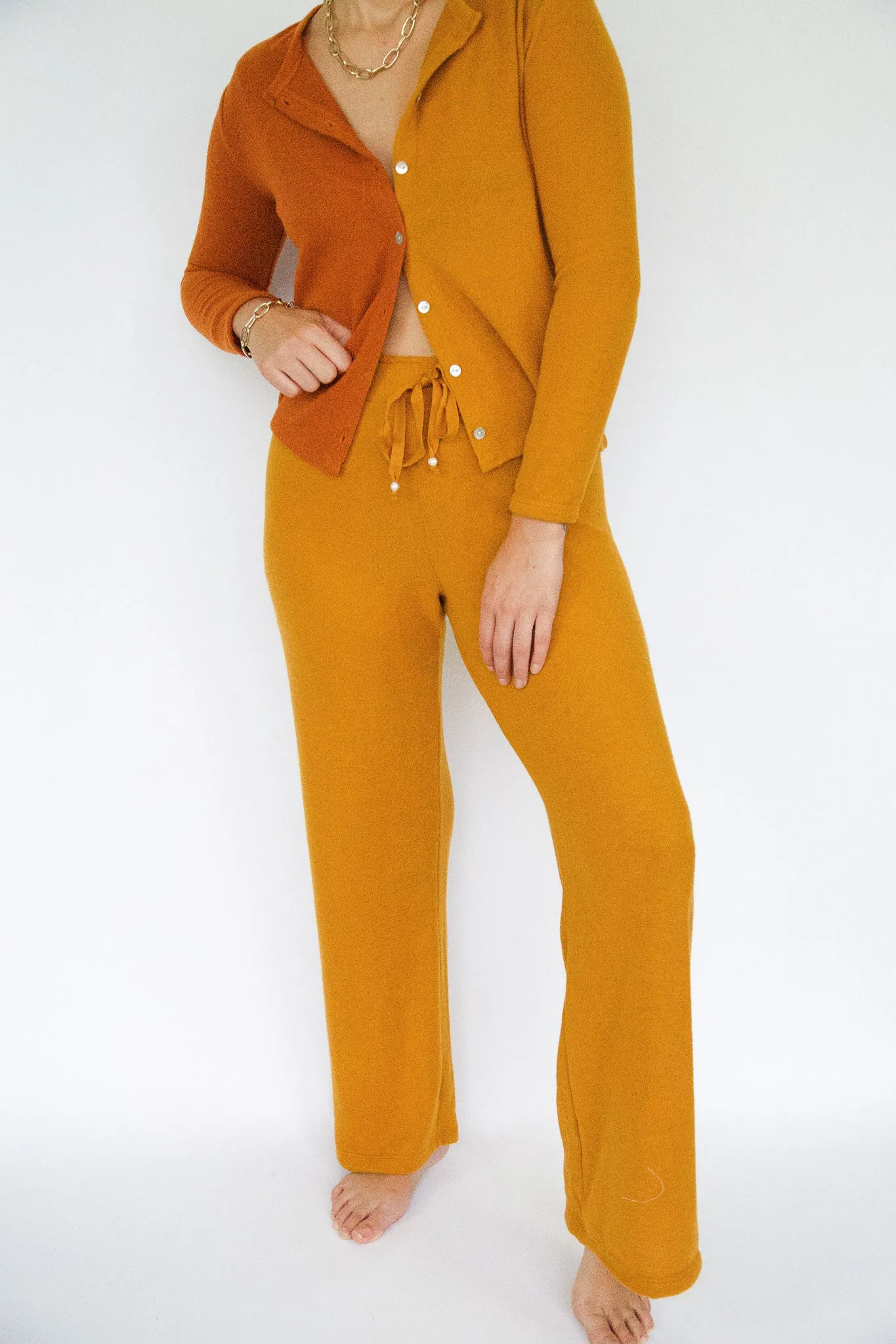 sweater cropped flare sweatpant sold by DONNI.