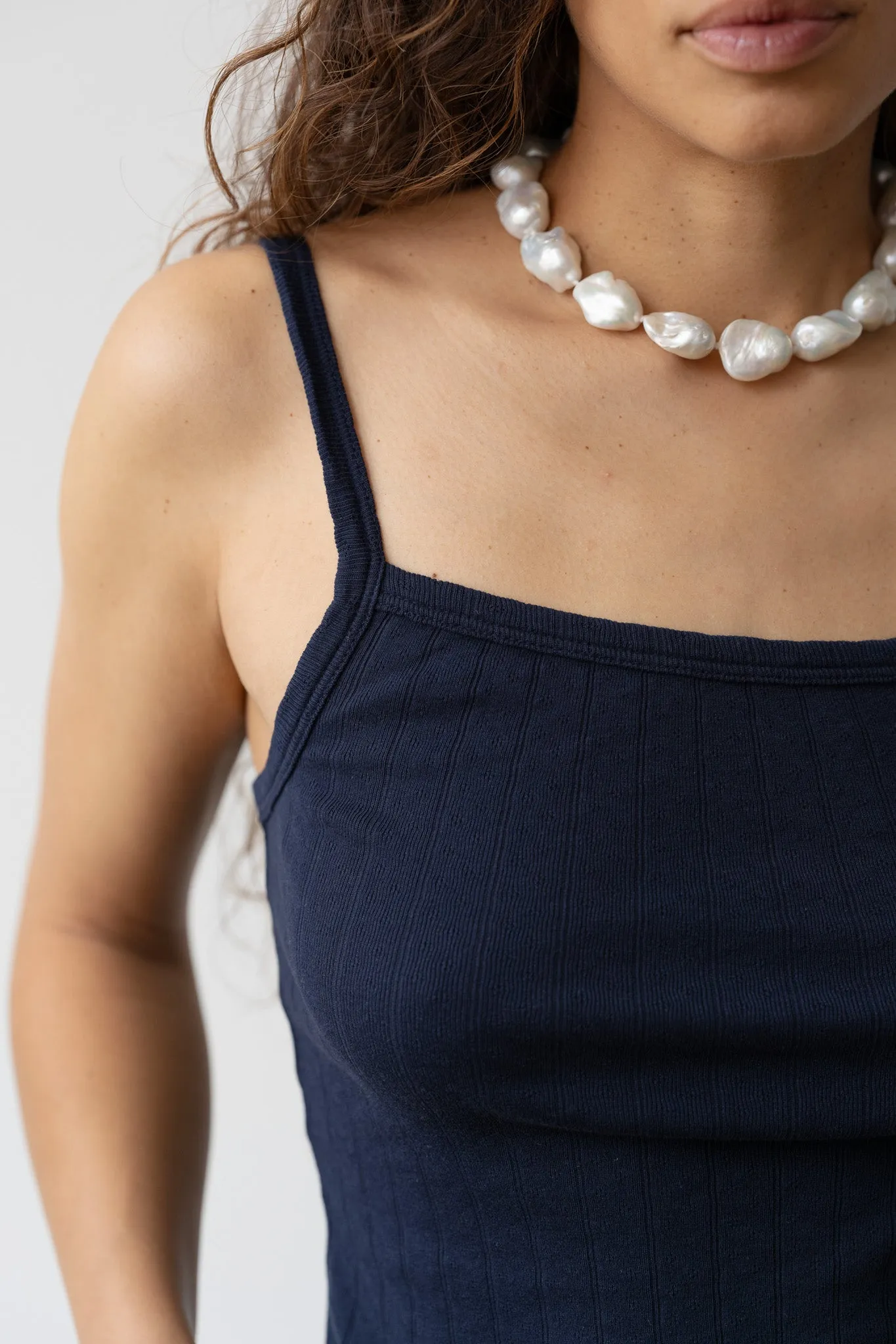 The Pointelle Square Neck Tank sold by DONNI.