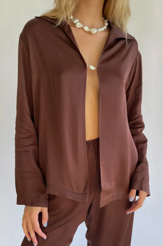 silky baroque pearl top sold by DONNI.