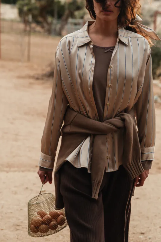 The Silk Pinstripe Shirt sold by DONNI.