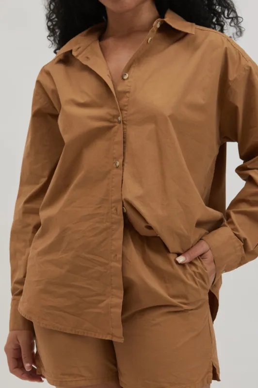 pop button down camel sold by DONNI.