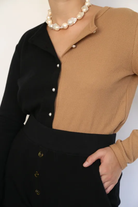 duo thermal cardi sold by DONNI.