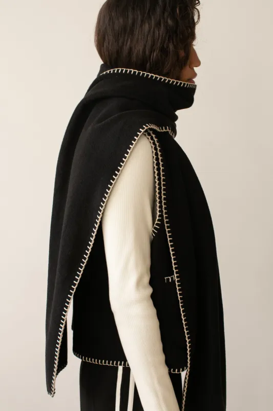 The Polar Fleece Stitch Scarf sold by DONNI.