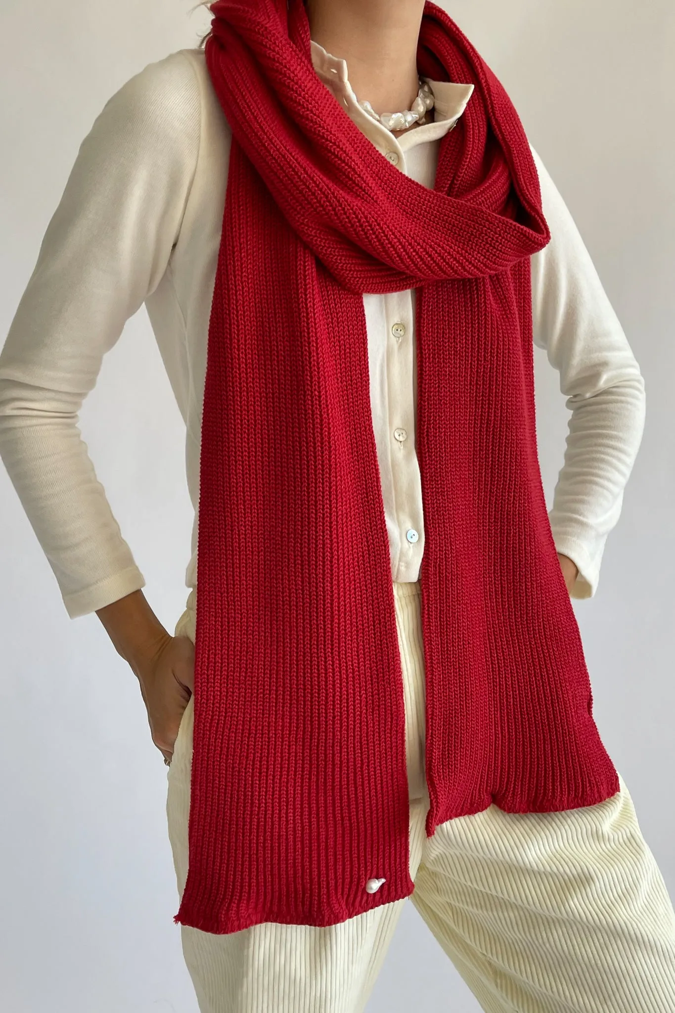 pearl scarf sold by DONNI.