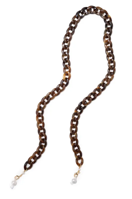 acetate mask/sunny chain sold by DONNI.