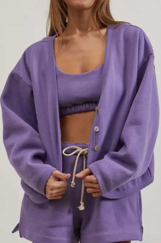 eco-fleece cardi sold by DONNI.