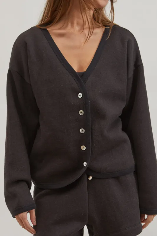 eco-fleece cardi sold by DONNI.