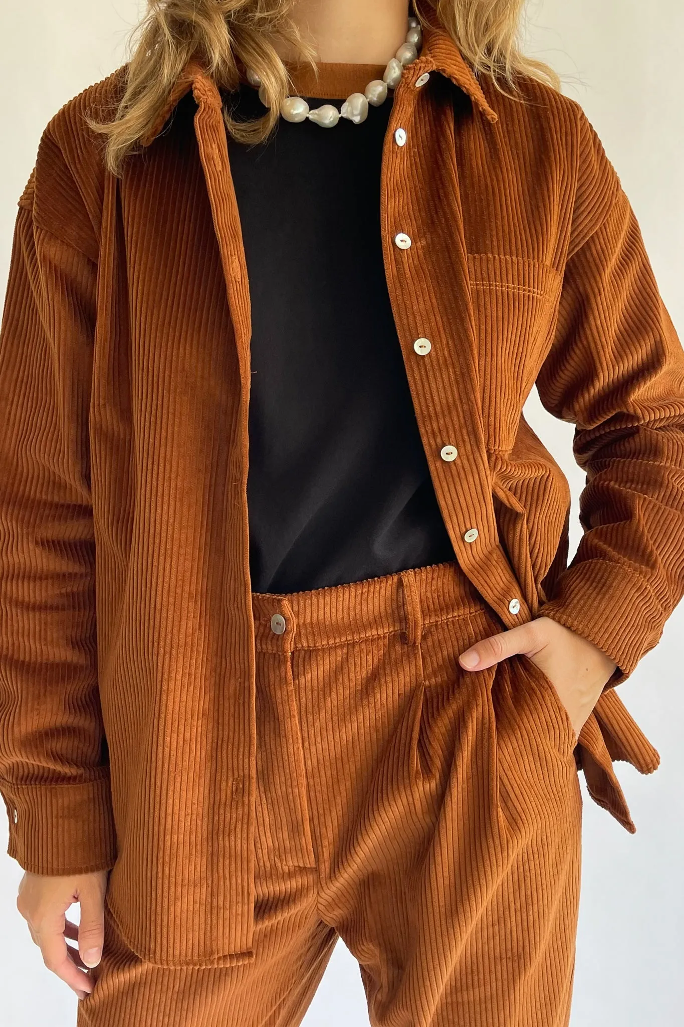 cord button down sold by DONNI.