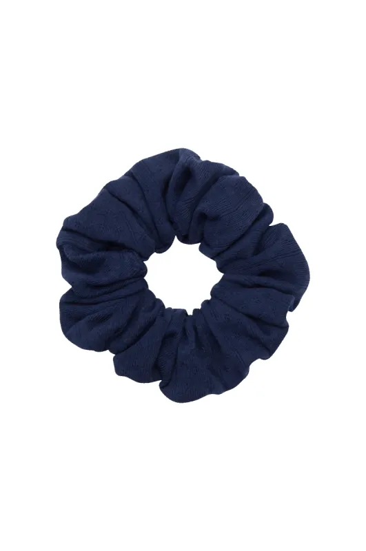 The Pointelle Scrunchie sold by DONNI.