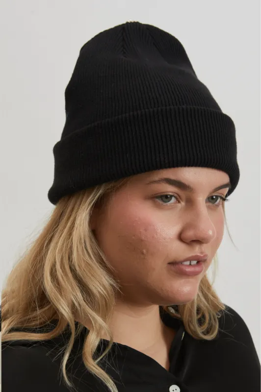 pearl beanie sold by DONNI.