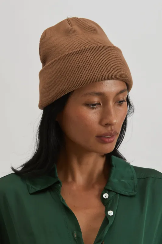 pearl beanie sold by DONNI.