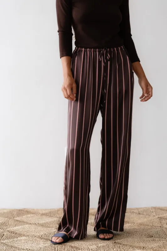 The Silk Pinstripe Drawstring Pant sold by DONNI.