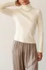 The Rib Turtleneck sold by DONNI.