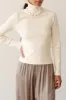 The Rib Turtleneck sold by DONNI.