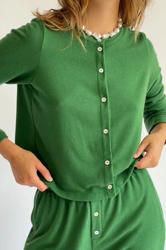 sweater cardi sold by DONNI.