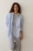 The Pop Button Down sold by DONNI.