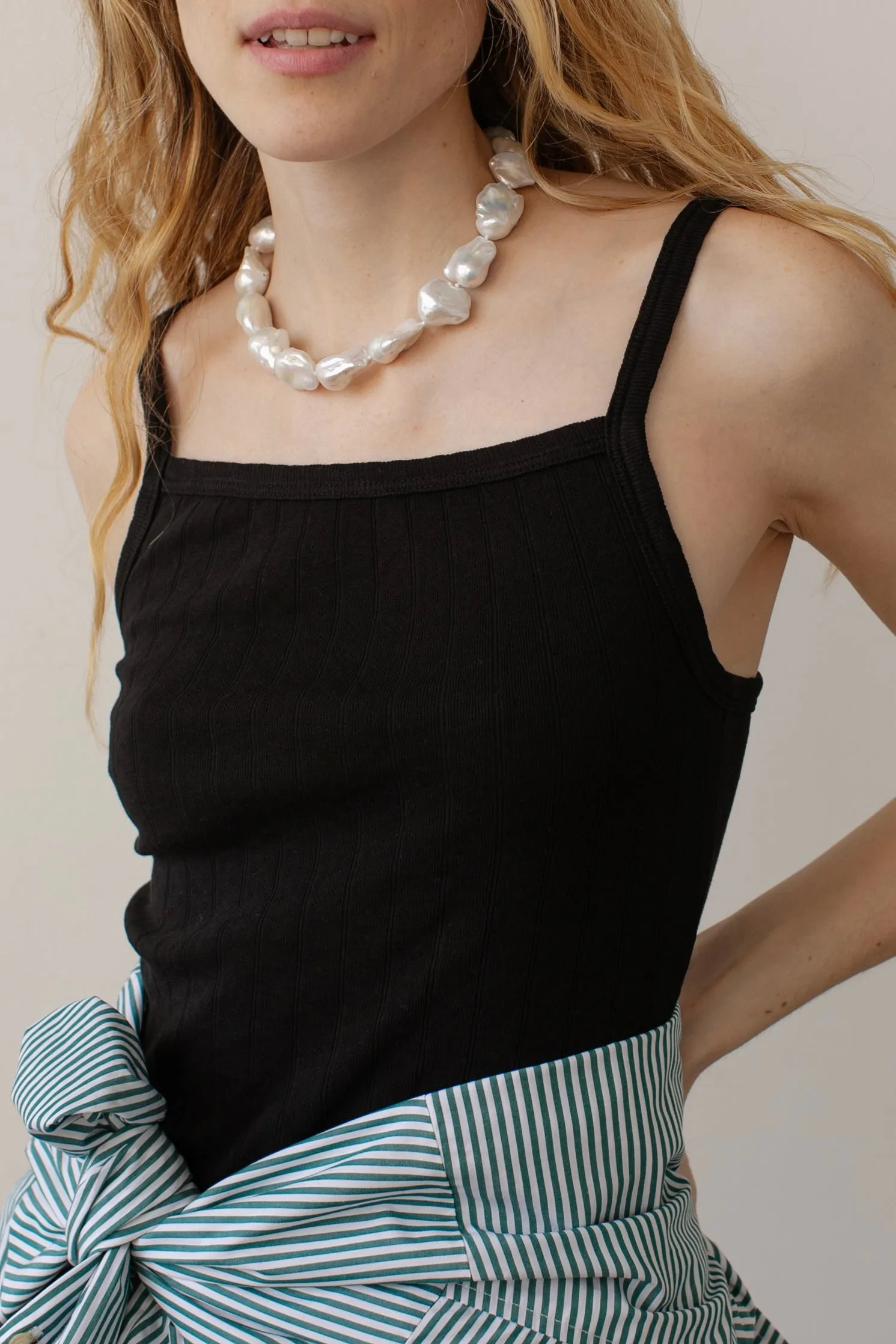 The Pointelle Square Neck Tank sold by DONNI.