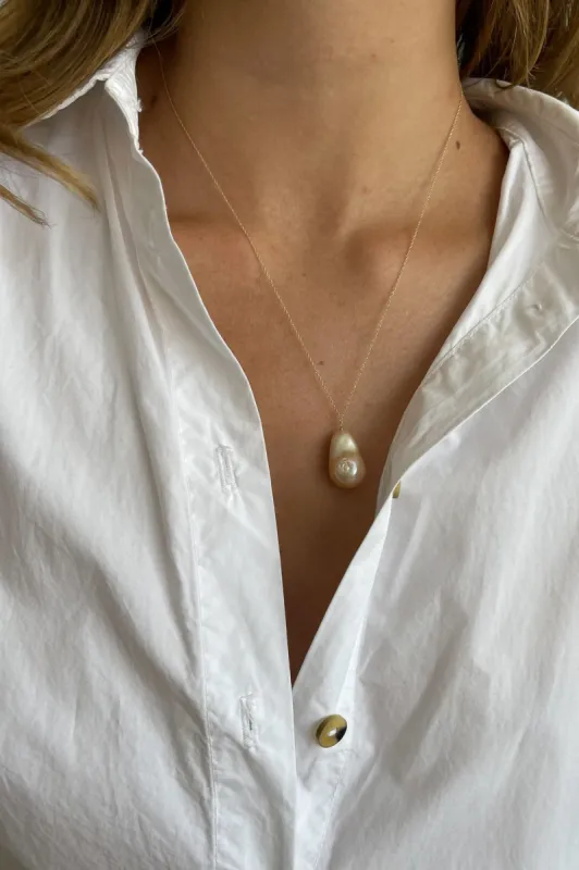 The June 20" Pink Pearl Necklace sold by DONNI.