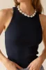 The Rib Tank sold by DONNI.