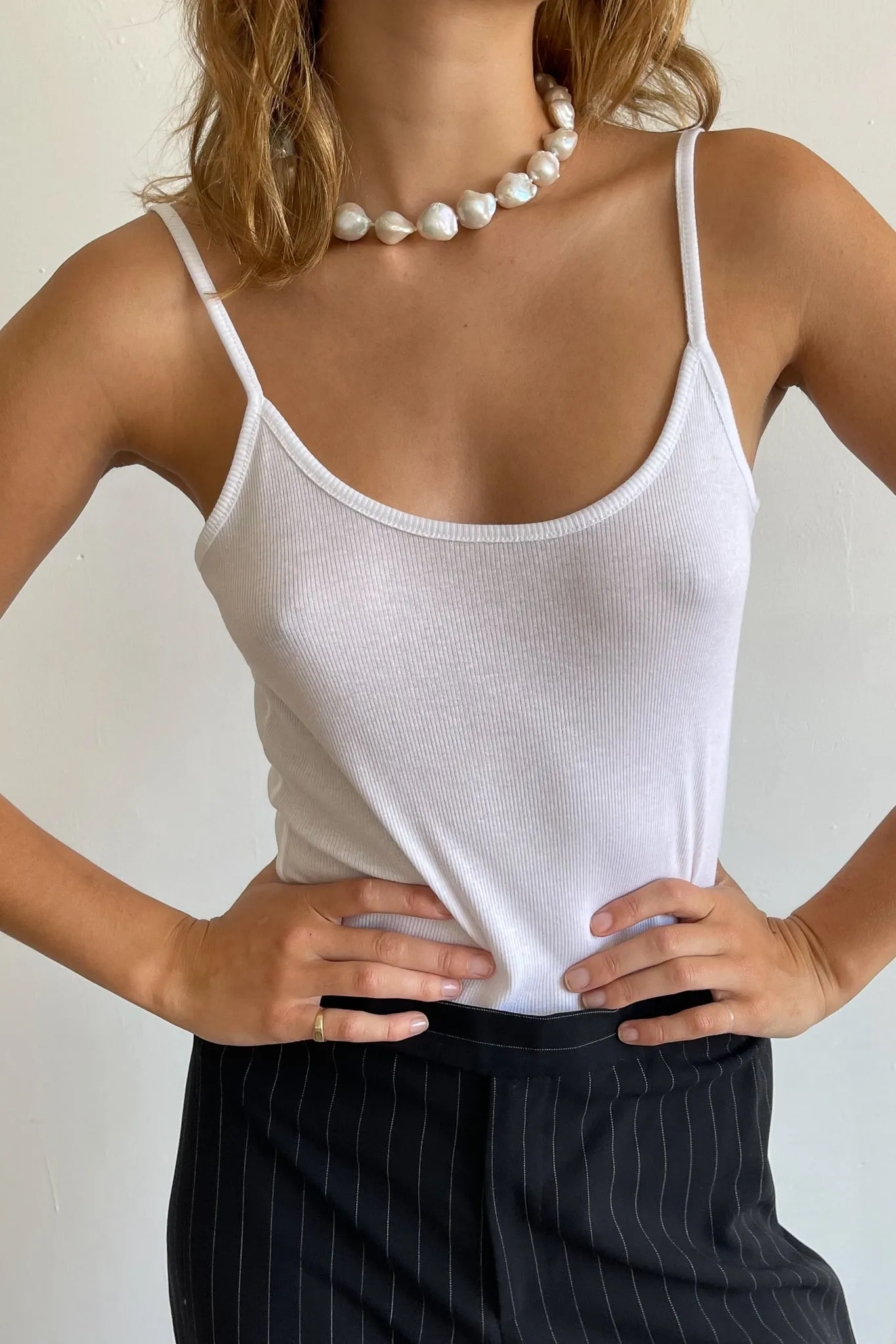 rib spaghetti tank sold by DONNI.