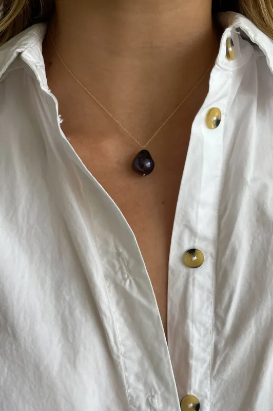 The June 16" Black Pearl Necklace sold by DONNI.