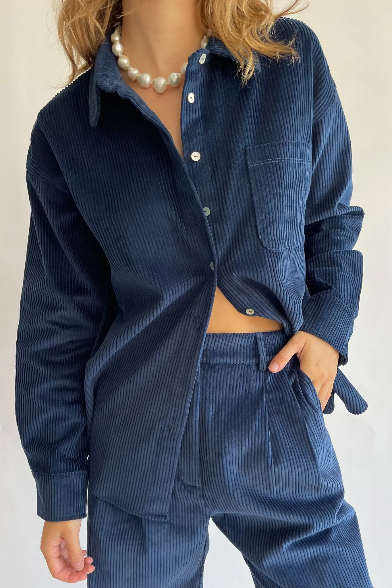 cord button down sold by DONNI.