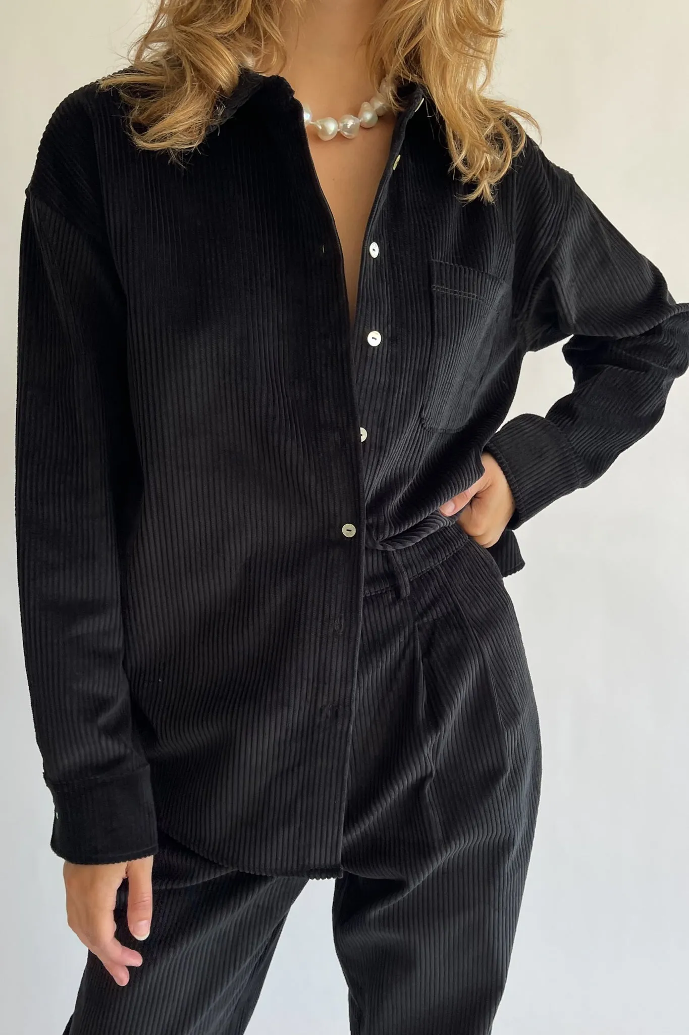 cord button down sold by DONNI.