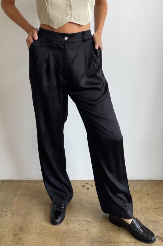 silky pleated pant sold by DONNI.