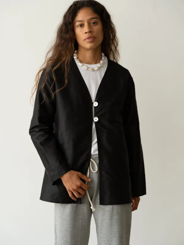 The Taffeta Split Top sold by DONNI.