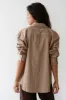 The Pop Button Down sold by DONNI.