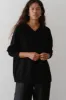 The Cotton Cashmere V-Neck Sweater sold by DONNI.