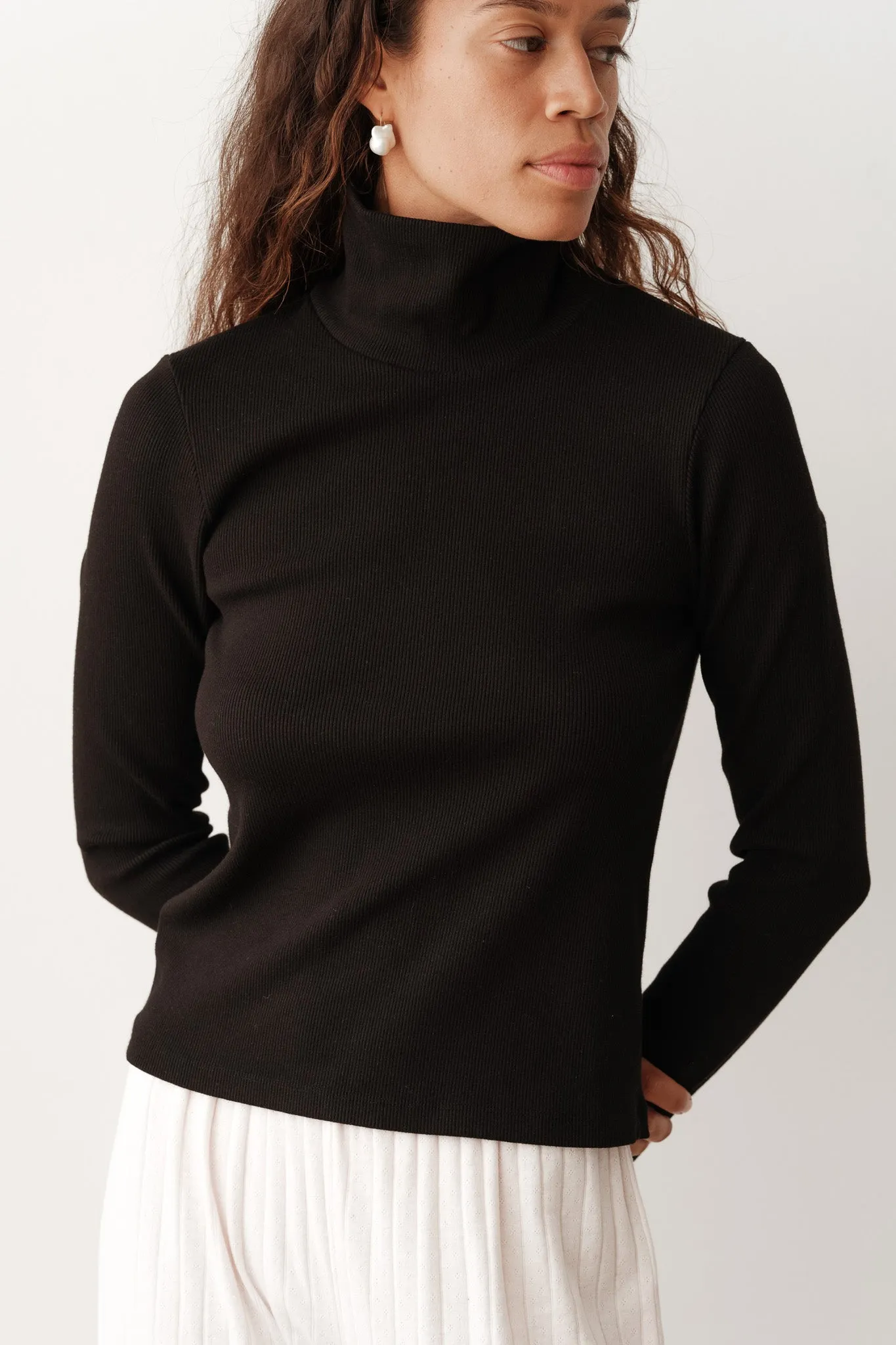 The Rib Turtleneck sold by DONNI.