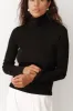 The Rib Turtleneck sold by DONNI.