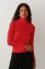 The Rib Turtleneck sold by DONNI.