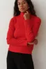 The Rib Turtleneck sold by DONNI.