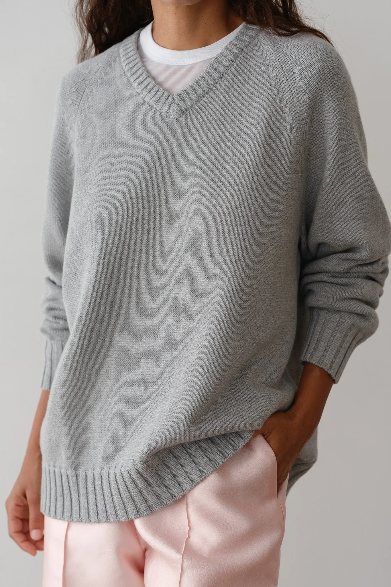 The Cotton Cashmere V-Neck Sweater sold by DONNI.