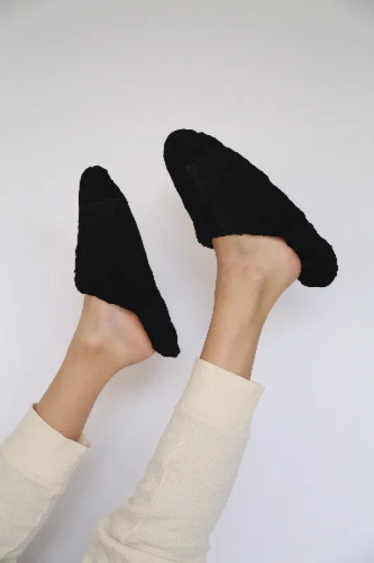 The Shearling Slipper Slides sold by DONNI.