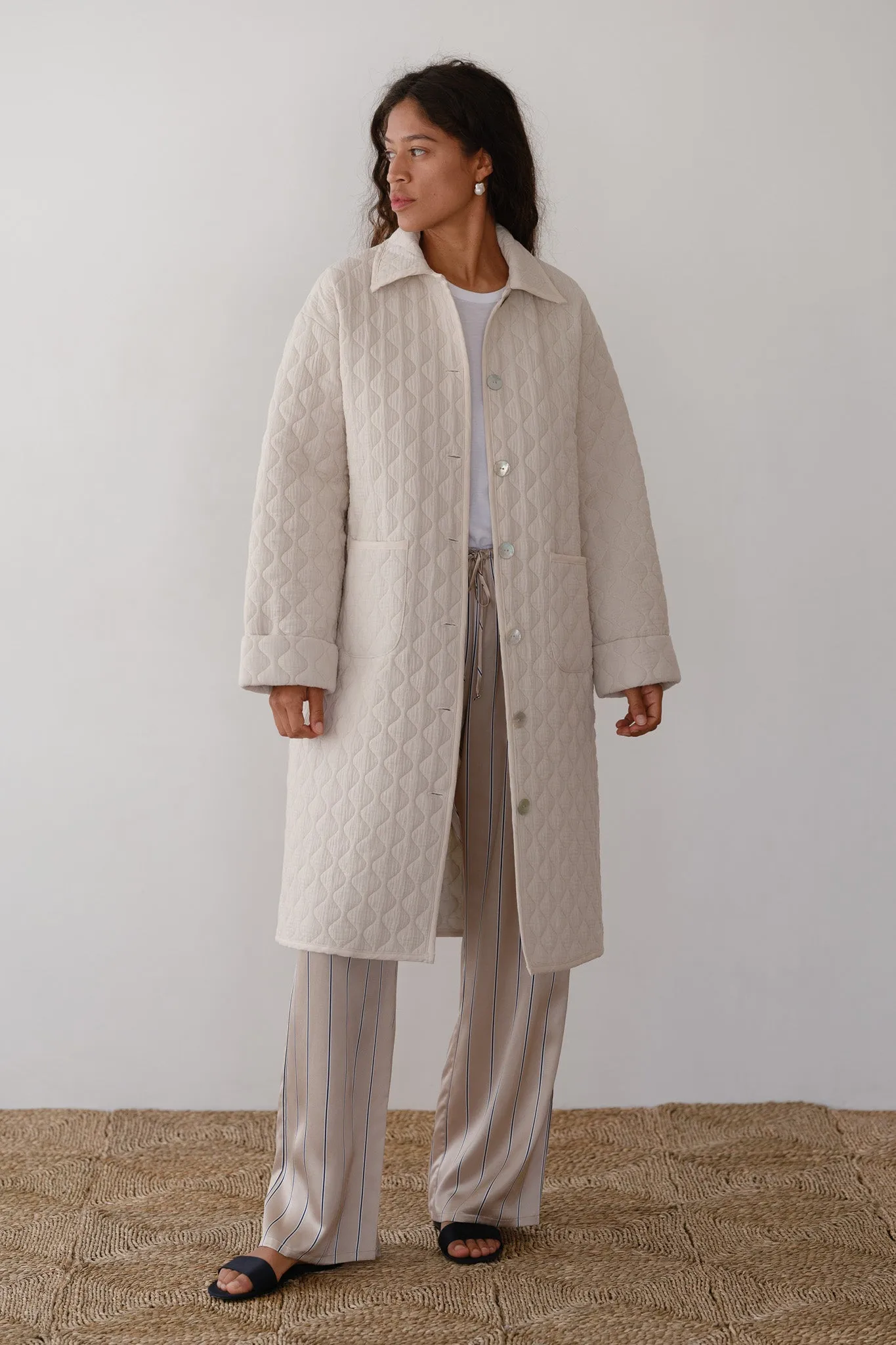 The Quilted Coat sold by DONNI.