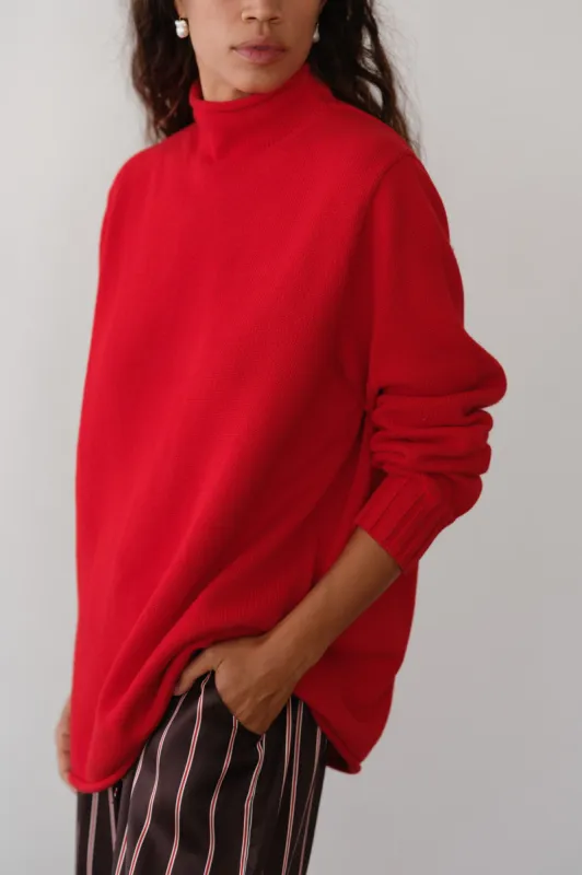 The Cotton Cashmere Roll Neck Sweater sold by DONNI.