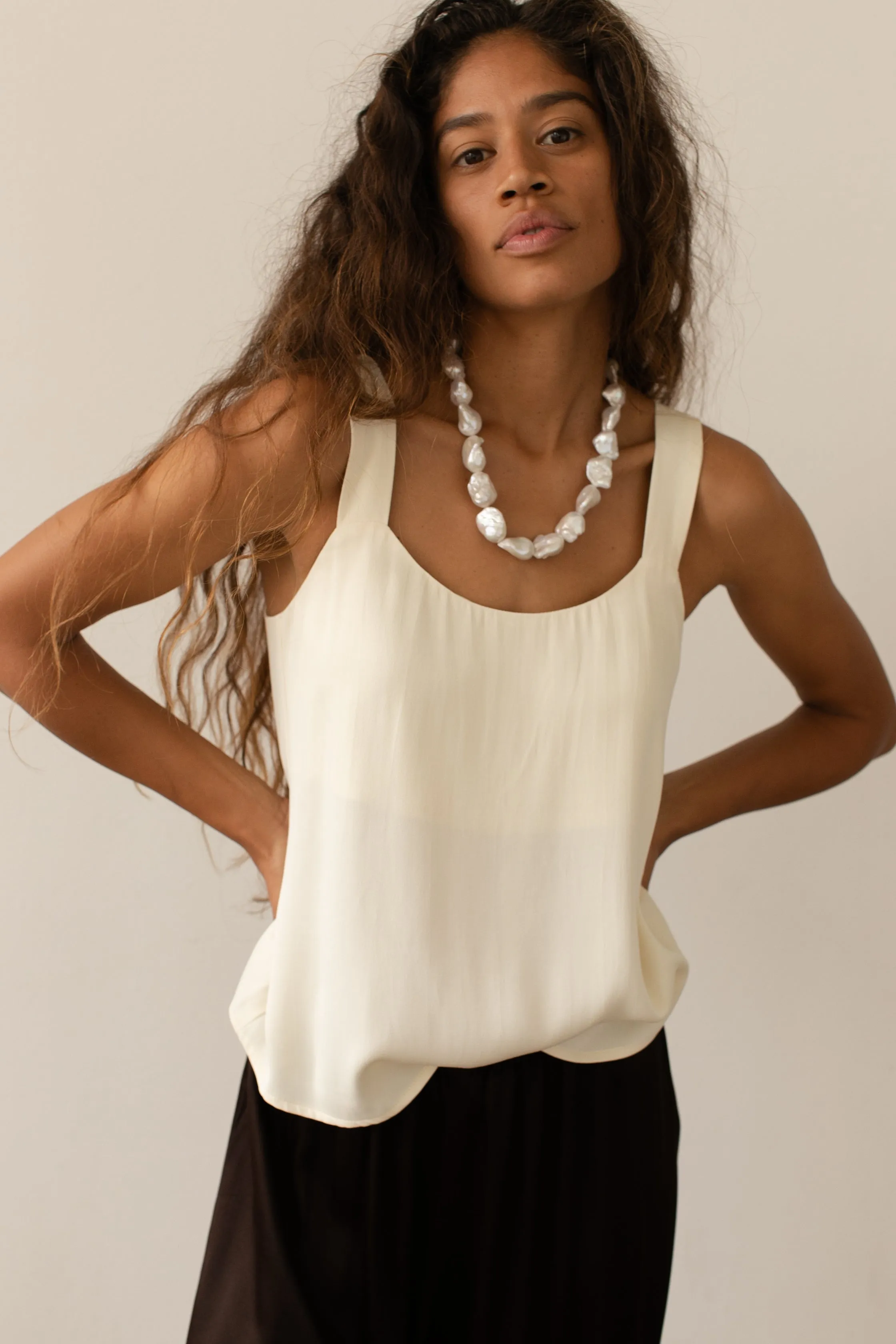 The Satiny Cami sold by DONNI.