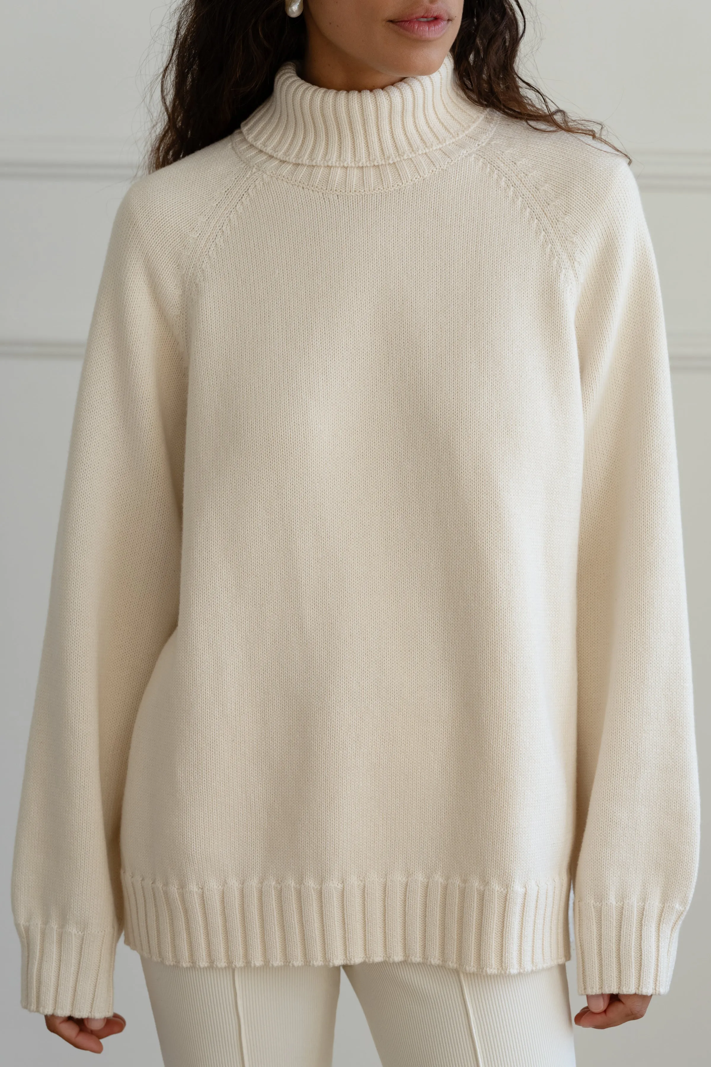 The Cotton Cashmere Turtleneck Sweater sold by DONNI.