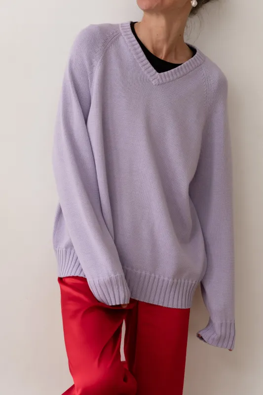 The Cotton Knit V-Neck Sweater sold by DONNI.