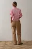 The Chino Drawstring Crop Pant sold by DONNI.