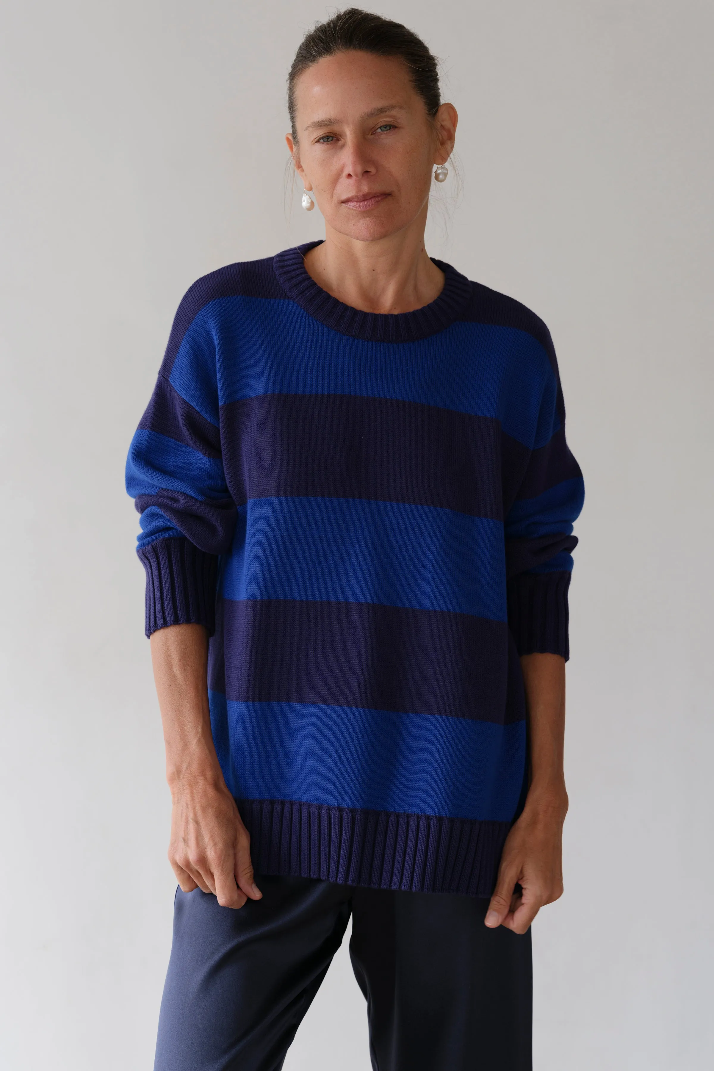 The Cotton Knit Stripe Crewneck Sweater sold by DONNI.