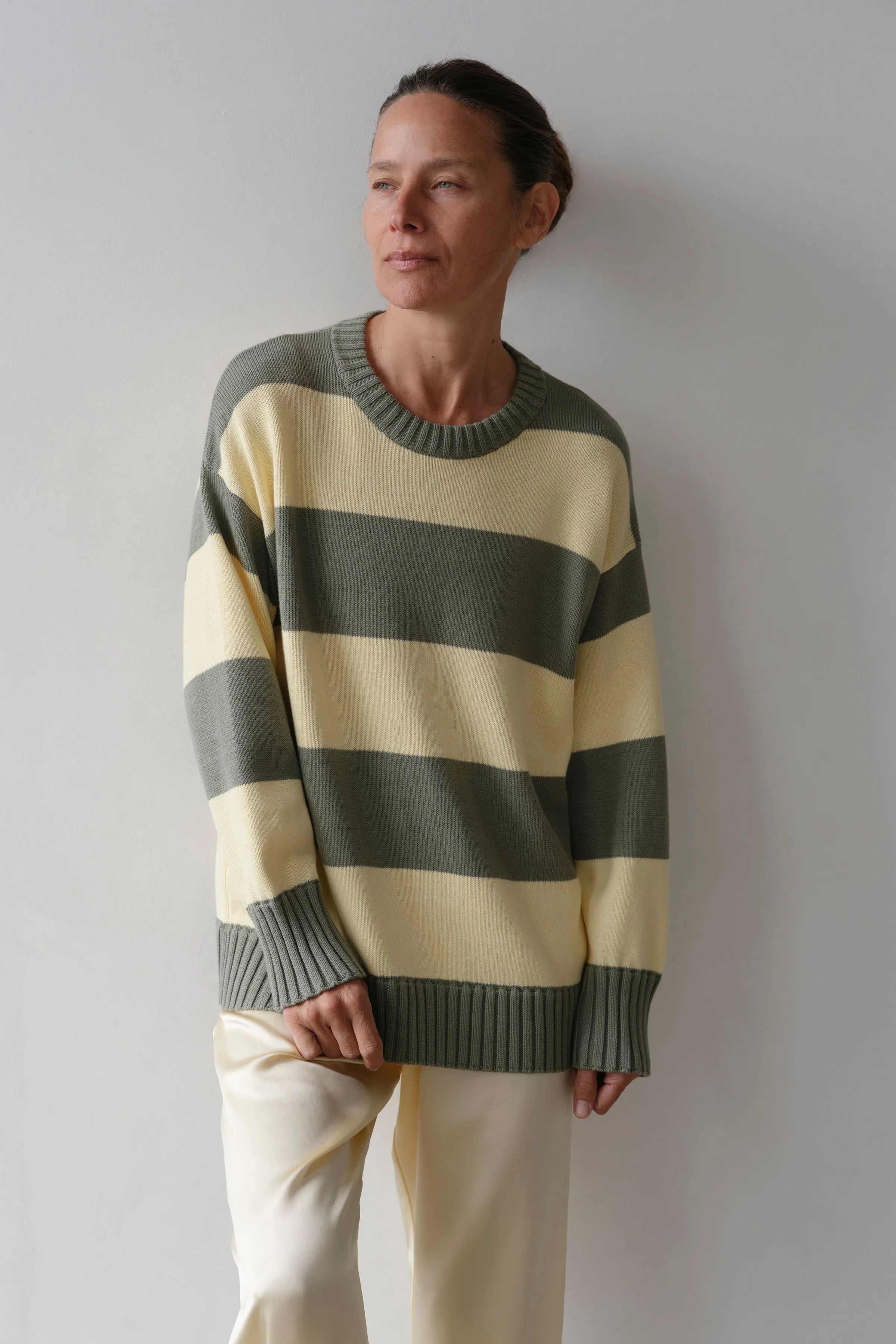 The Cotton Knit Stripe Crewneck Sweater sold by DONNI.