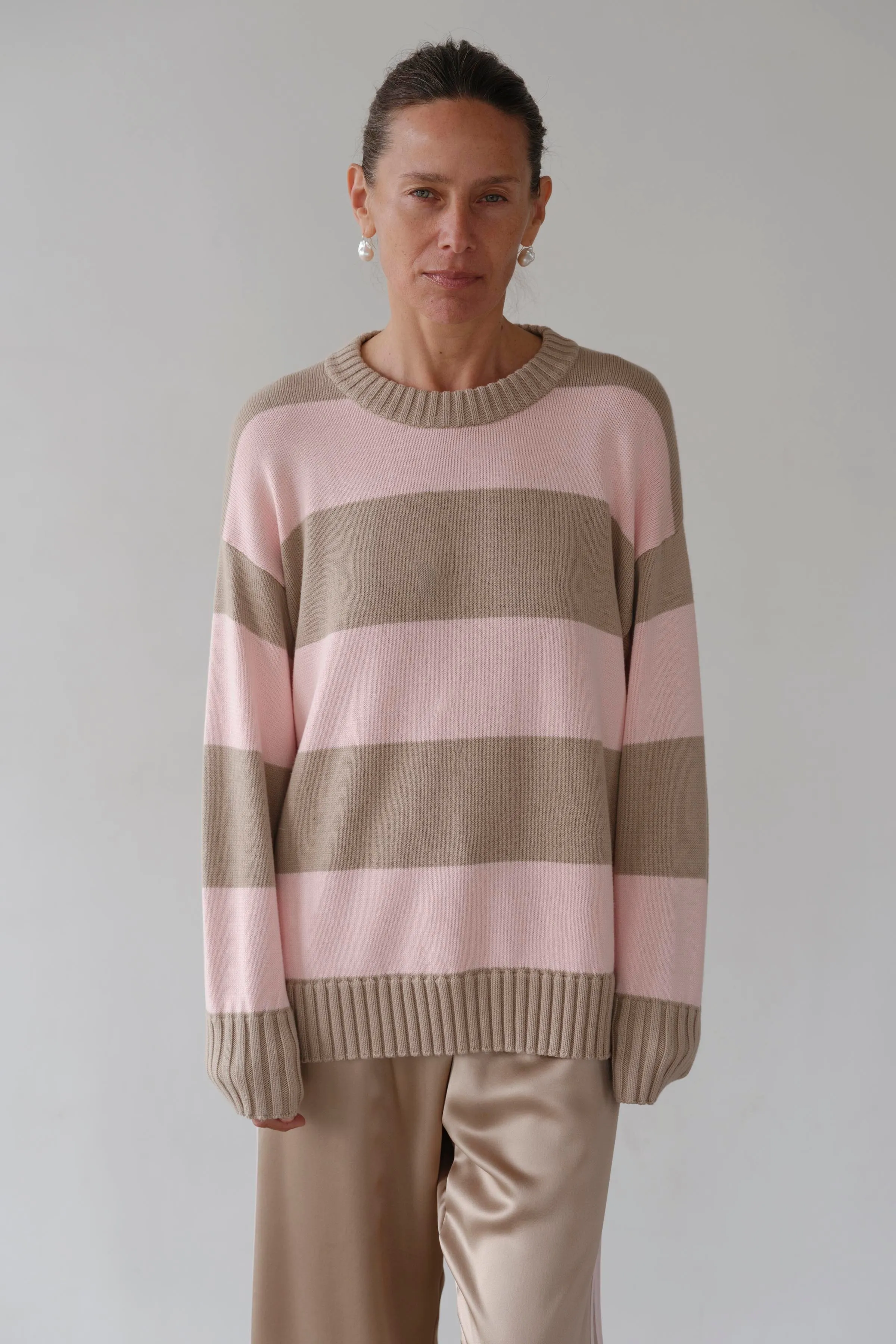 The Cotton Knit Stripe Crewneck Sweater sold by DONNI.