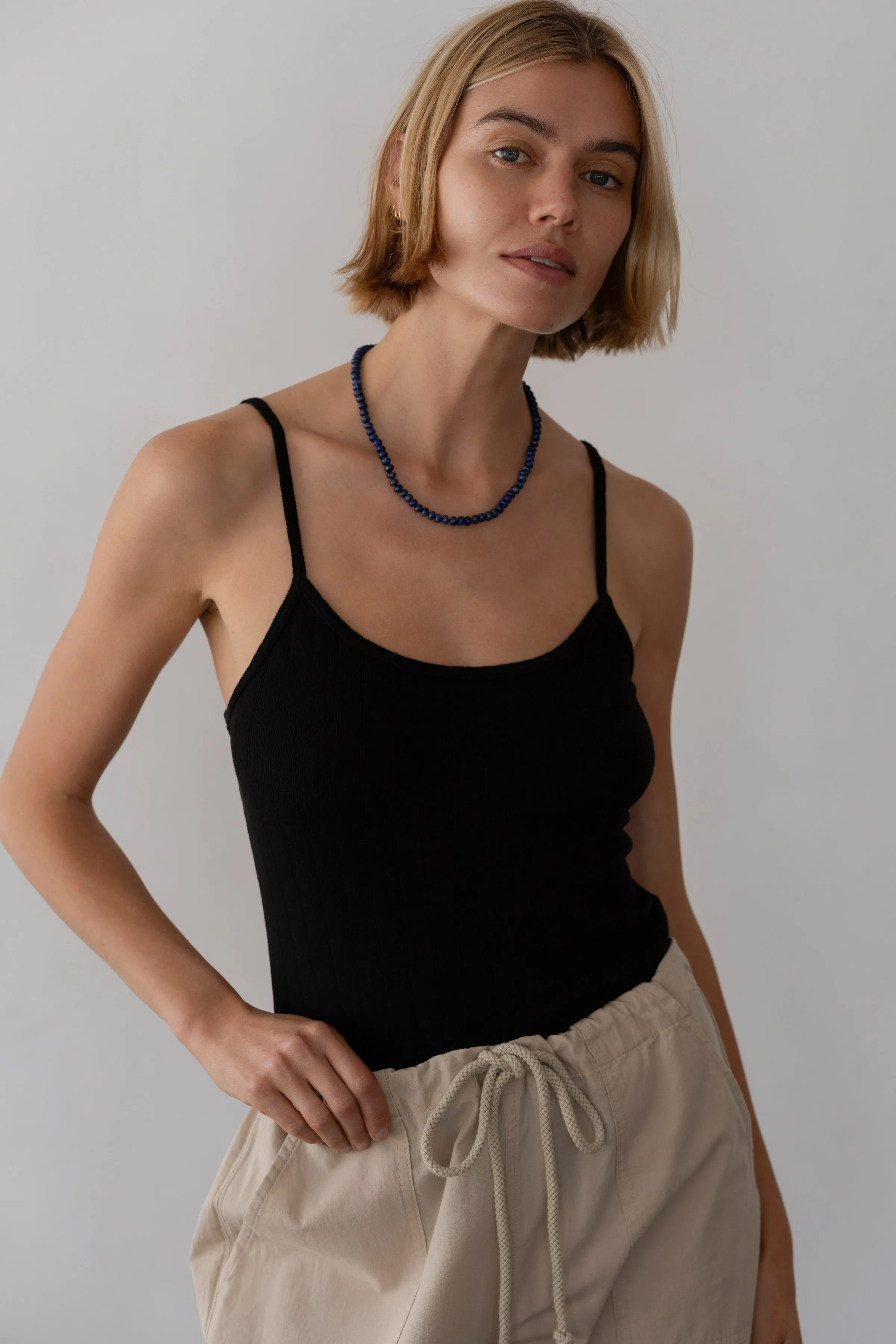 The Pointelle Cami Tank sold by DONNI.