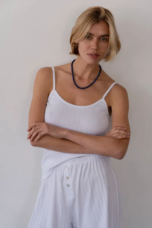 The Pointelle Cami Tank sold by DONNI.